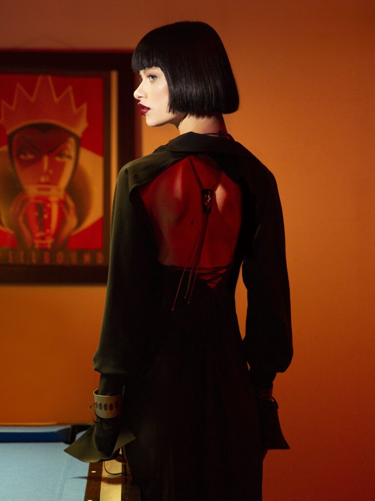 WOMEN WEARING A BACKLESS DRESS
